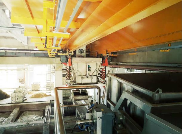 第四代：數(shù)控抓斗、料斗起重機(jī)